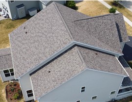 Stunning Architectural Transformation: TTLC Inc. Showcases Owens Corning Driftwood Shingles on Joliet, IL House, Evoking Timeless Style