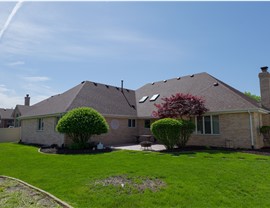 "Roof with Owens Corner Desert Rose Shingles by TTLC Inc. in Orland Park, IL."
