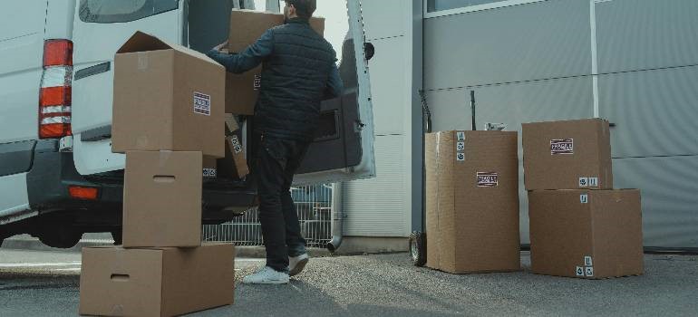 a person unloading things long distance movers won't move