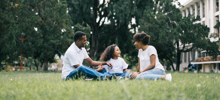 a family having a picnic together in one of the places in the Bay Area to raise a family