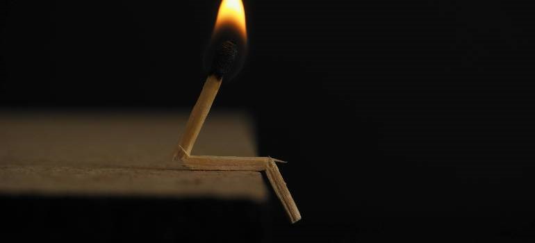 Burning matchstick