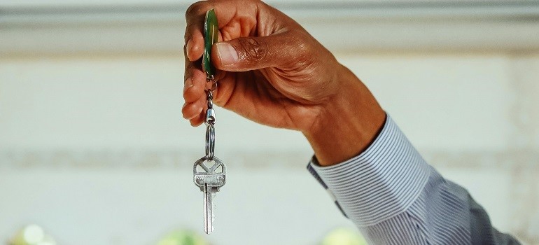Hand holding keys