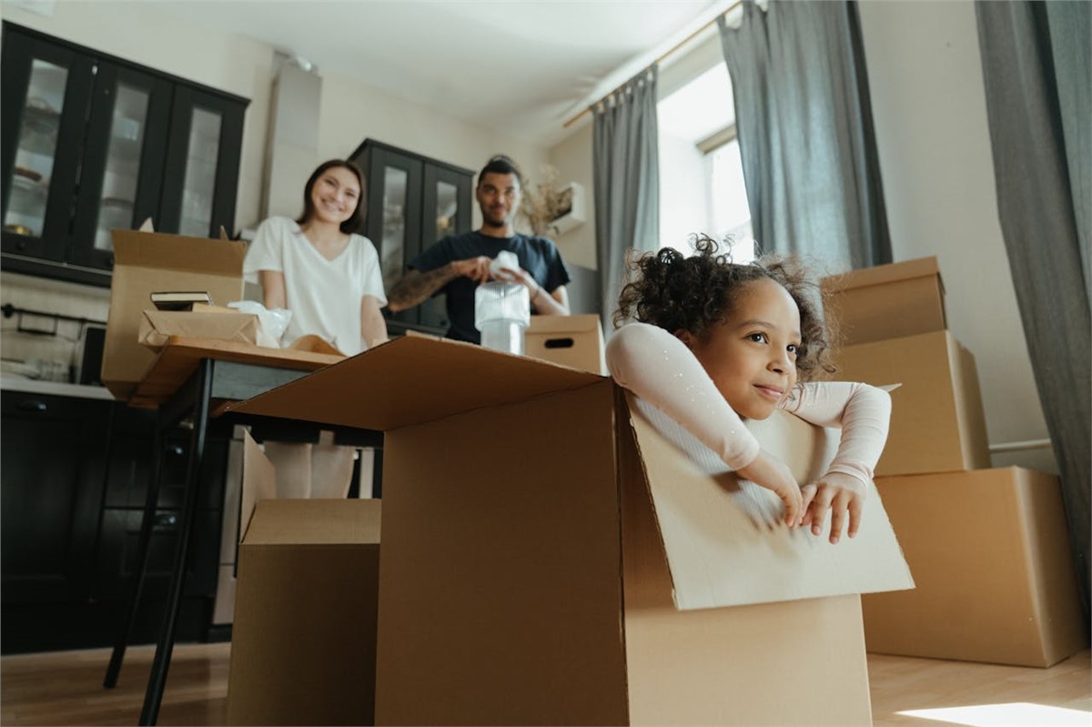 family packing for the move after reading about where are Californians moving to