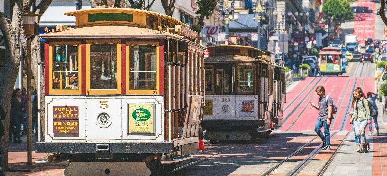 Iconic cable cars and busy downtown street