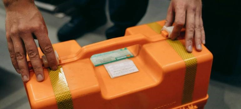 Emergency kit box with supplies to help you be ready for natural disasters in California this National Disaster Preparedness Month