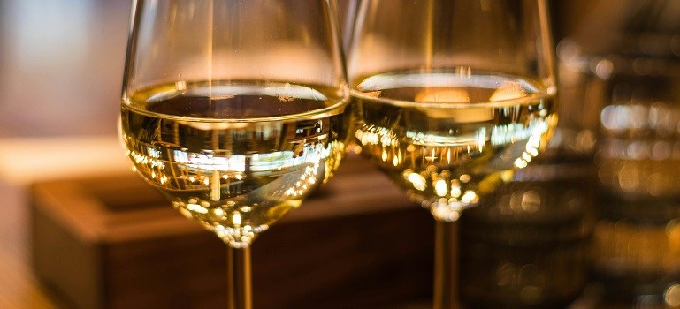 Two glasses of wine for a toast during Thanksgiving traditions in the Bay Area.