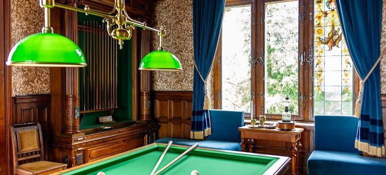 Billiard table in a vintage room. 