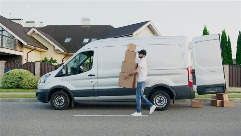 household movers carrying boxes 