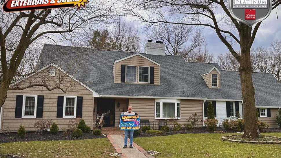Home with new roof installed by Warner Exteriors contractor