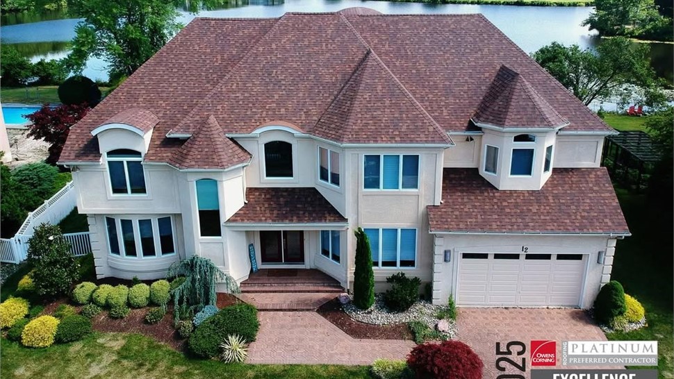 Aerial view of new roof installation on Voorhees NJ home by Warner Exteriors & Solar