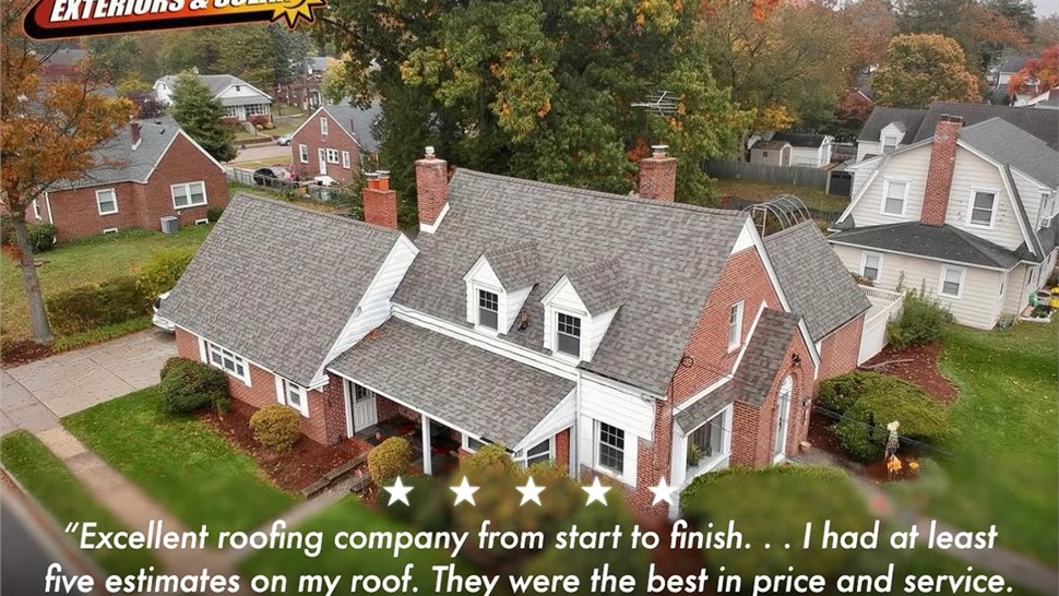 Aerial view of a home with new roof installation featured in a Warner Exteriors customer testimonial.
