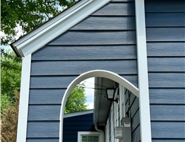 James Hardie fiber cement lap siding in deep blue installed on New Jersey home by Warner Exteriors