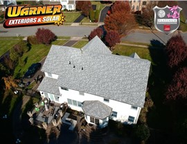 New Owens Corning Sierra Gray roof on two-story New Jersey home installed by Warner Exteriors