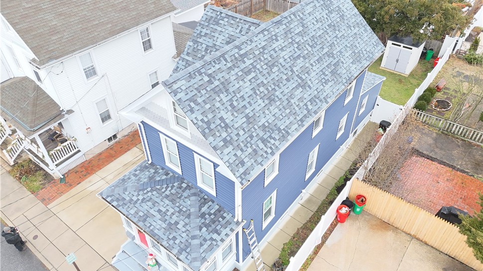 Completed roof replacement in Haddonfield NJ by Warner Exteriors with OC Duration shingles
