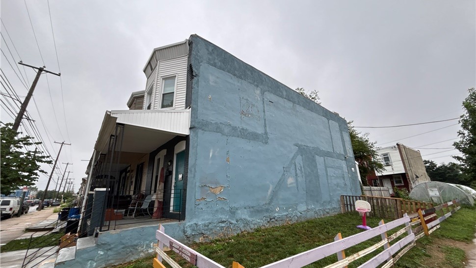 Stucco removal before vinyl siding replacement in Philadelphia PA