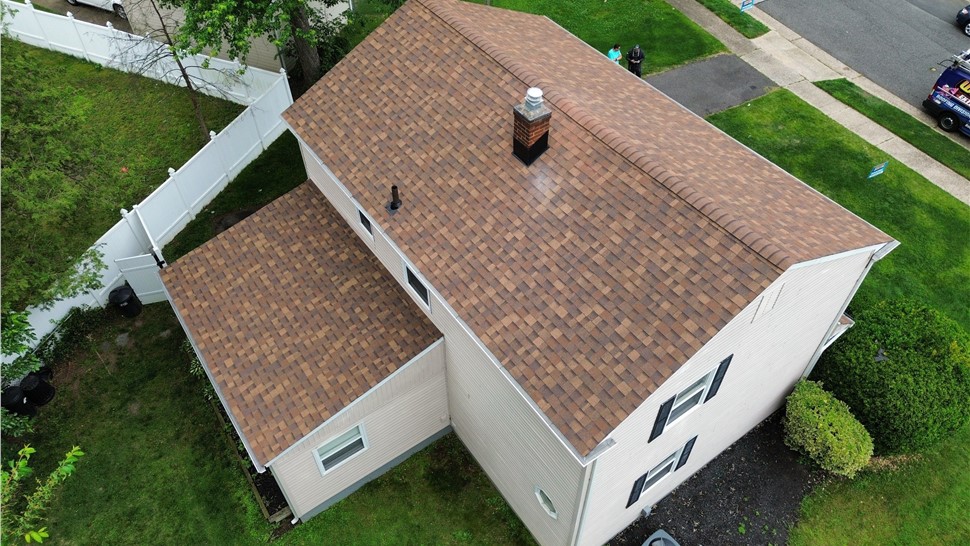 Completed roof replacement in Merchantville NJ backyard view