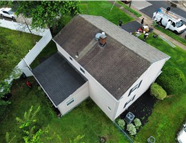 Old asphalt roof condition before replacement in Merchantville NJ