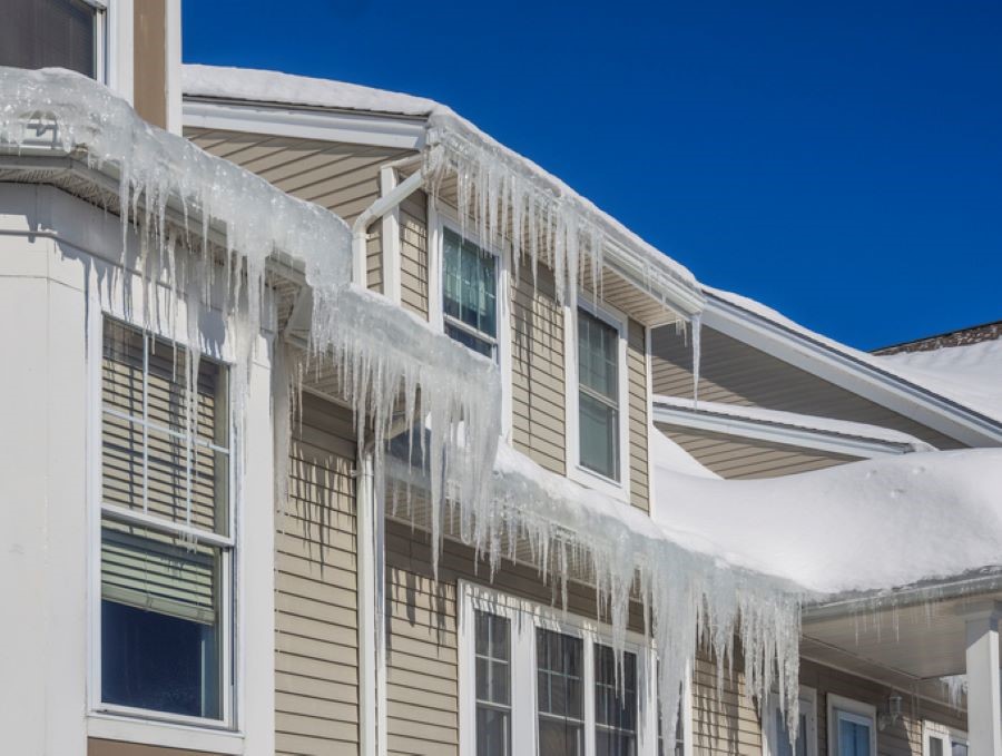 Roof with snow and icicles 