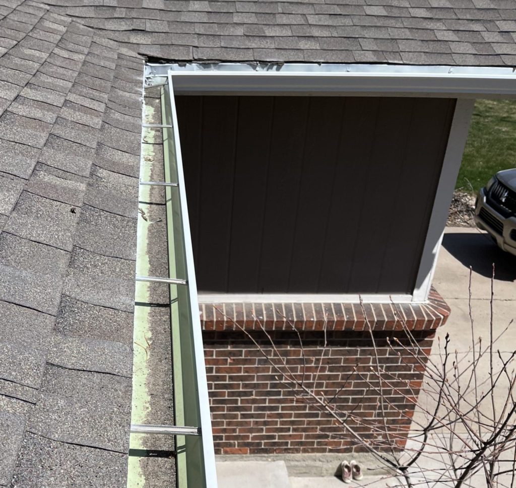 Shingle granules in gutters. Sign you need a new roof. 