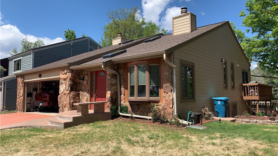 Full home view of Louisville home in Colorado before James Hardie install