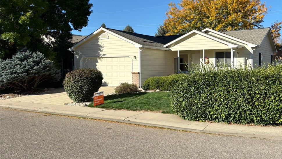 Completed GAF Timberline Armorshield II in Charcoal installation and new gutter system installation on home in Loveland Colorado