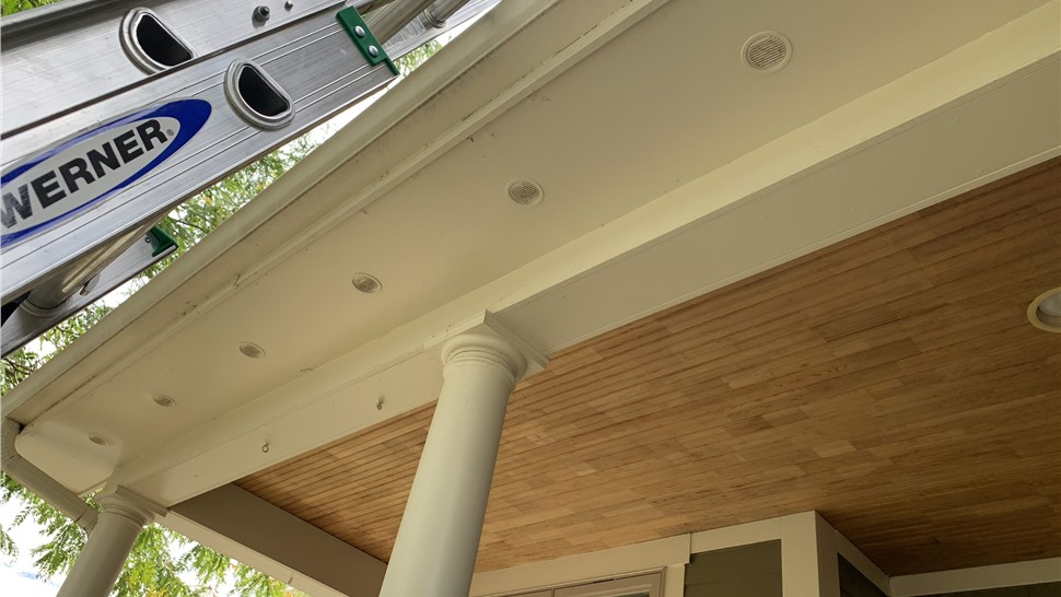 Original soffit and porch detail on the Longmont, Colorado home before the project