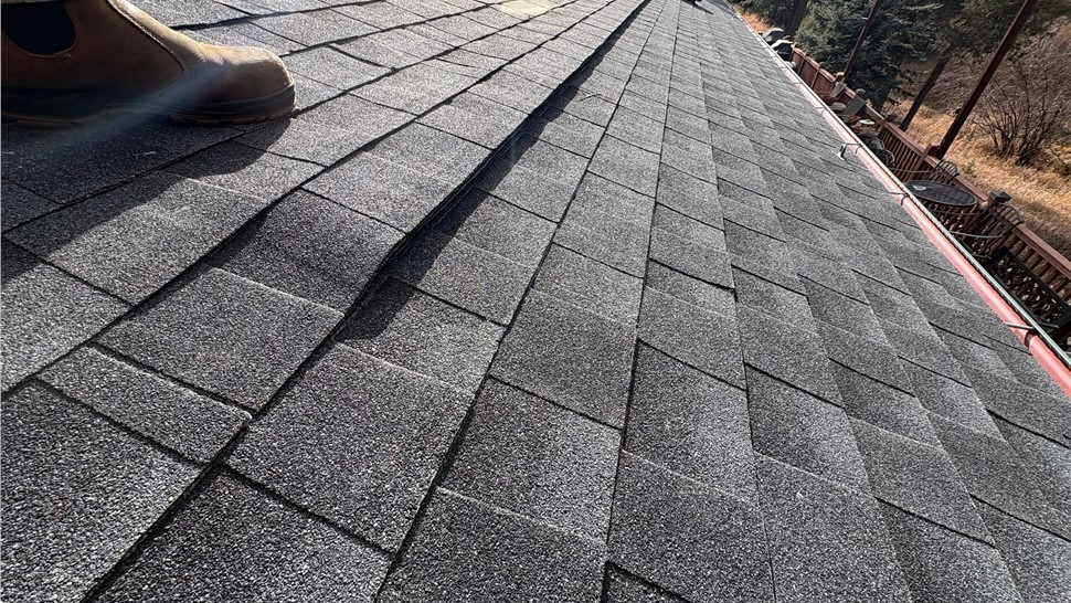 Close up shingle view of GAF Timberline Armorshield II in Charcoal with upgraded ventilation on a home in Lyons Colorado