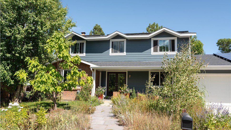 Front elevation of a Boulder home with new James Hardie lap siding in Evening Blue