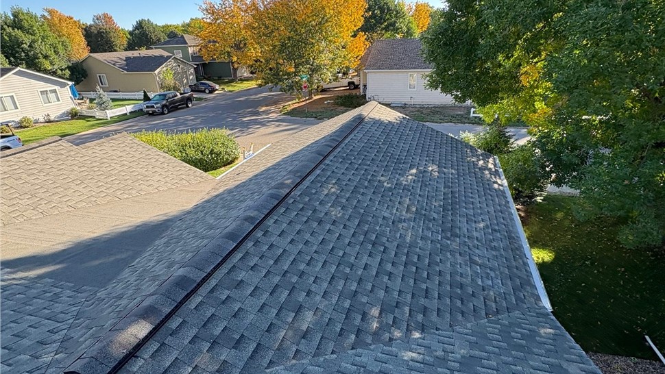 Completed GAF Timberline Armorshield II in Charcoal installation and new gutter system installation on home in Loveland Colorado