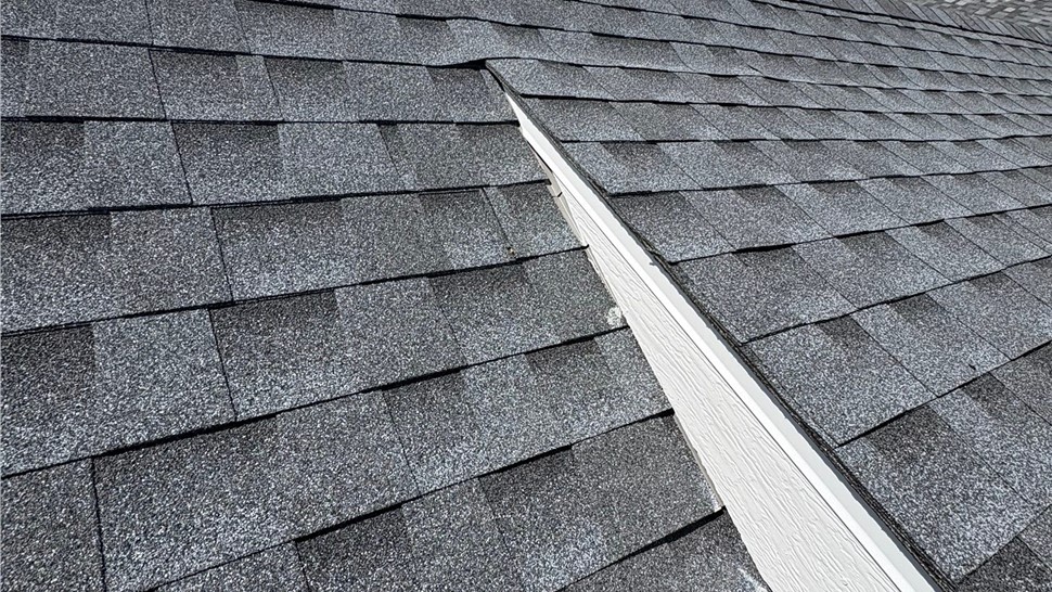 New GAF ArmorShield II shingles in Pewter Gray along a roof valley in Eaton, Colorado