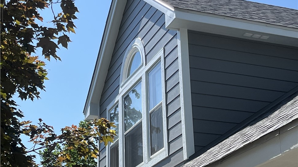James Hardie Cedarmill siding and trim around a gable window in Fort Collins