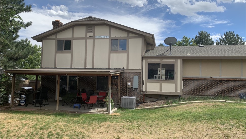Home in Arvada Colorado before siding replacement from WestPro Home Exteriors