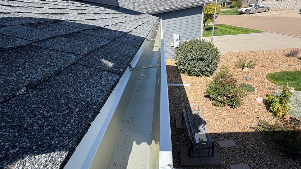New seamless gutter run along a roof edge in Eaton, Colorado
