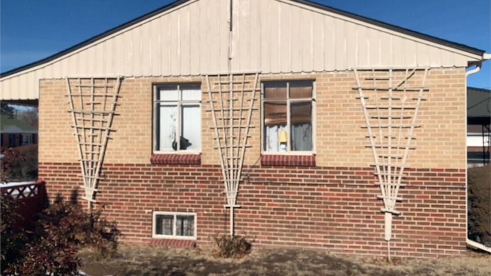 Side view of home before full window replacement in Denver Colorado