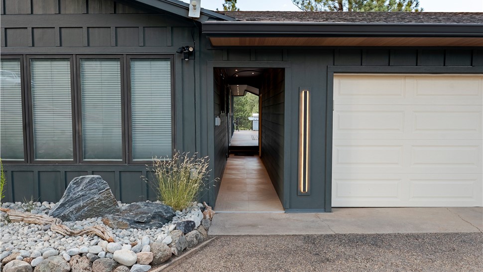 James Hardie siding installation in Iron Gray with Gilded Grain Vesta Soffits in Boulder, Colorado