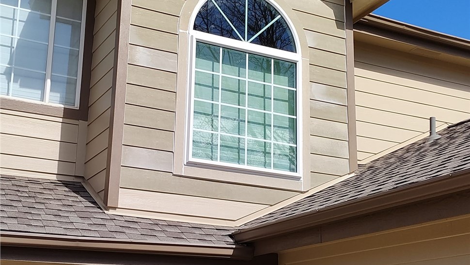 Completed James Hardie Primed siding replacement and ProVia Endure series window replacement in Loveland Colorado