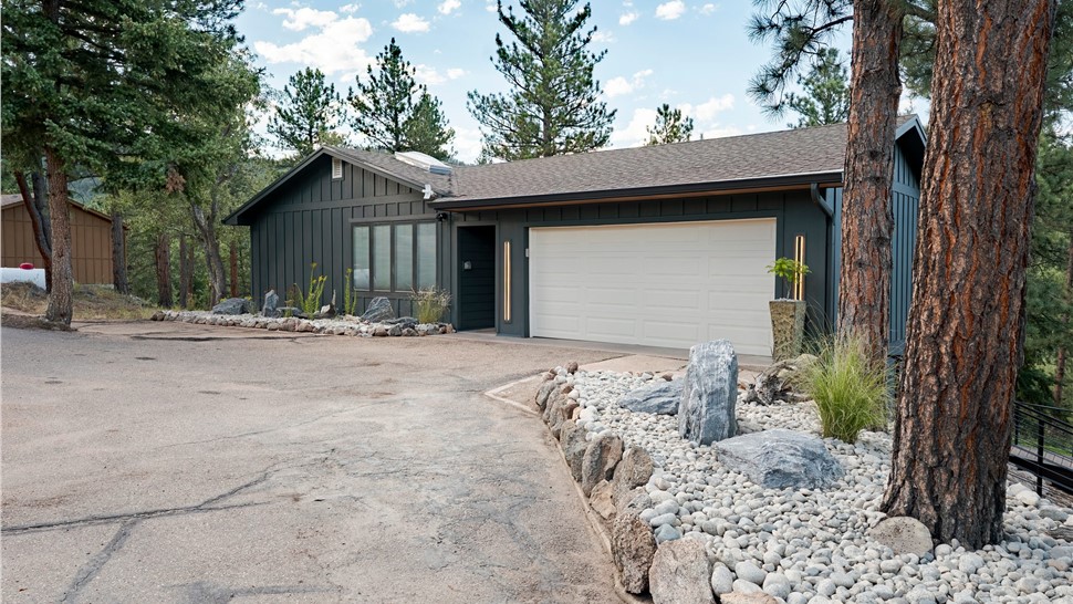 James Hardie siding installation in Iron Gray with Gilded Grain Vesta Soffits in Boulder, Colorado