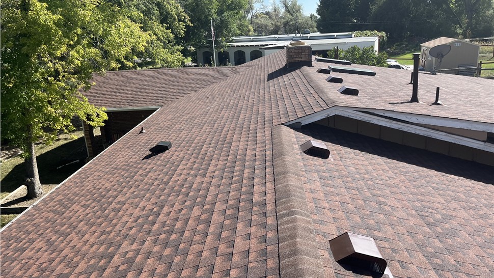 New roof above porch overhang after replacement in Longmont Colorado