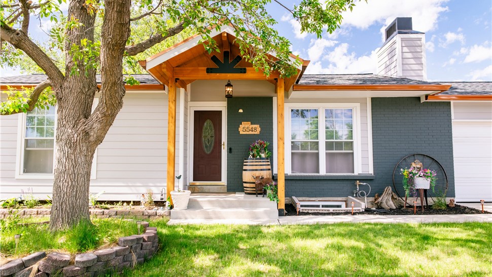 Home in Thornton, Colorado after full James Hardie Reside, GAF Armorshield II Installation and Gutter Replacement
