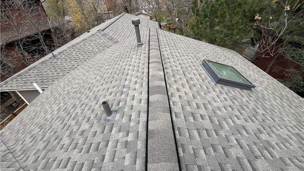 Velux FCM solar-powered skylight and GAF ArmorShield II shingle roof in Boulder, Colorado