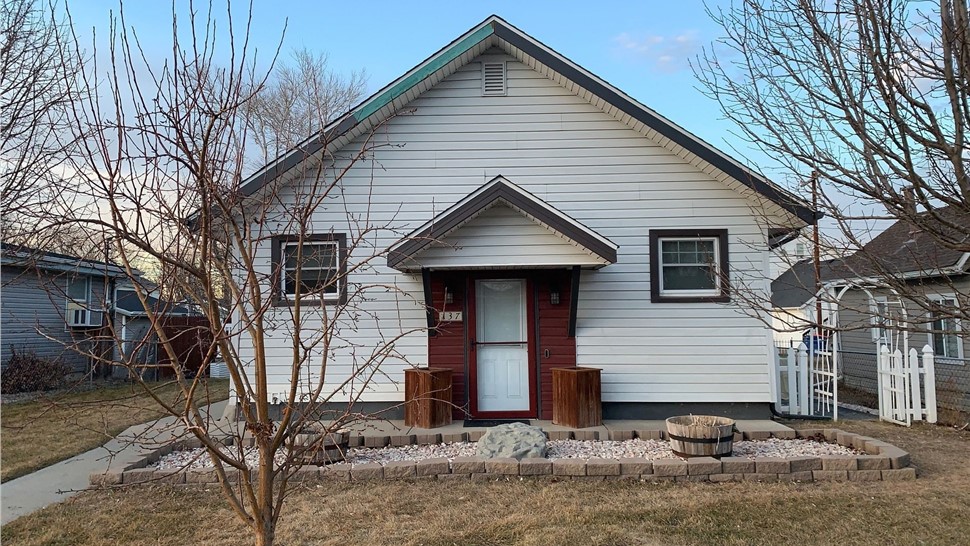 Frederick Colorado home before complete siding replacement with James Hardie fiber cement
