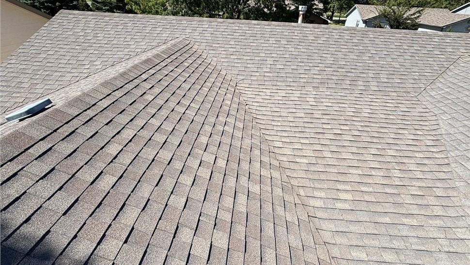 Deteriorated roof with granule loss on home before roof replacement in Loveland Colorado