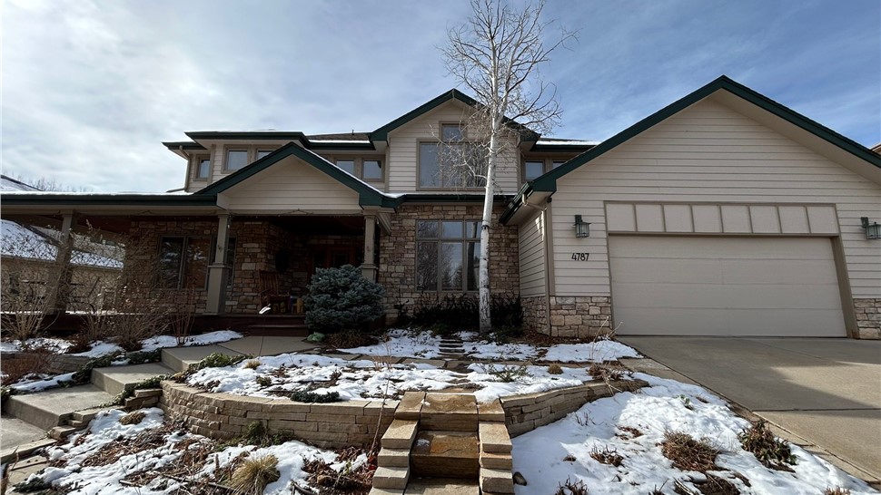 Home before siding, roofing and gutter install in Boulder, Colorado