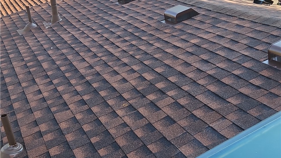 GAF ArmorShield II shingles and skylight after roof replacement in Longmont Colorado