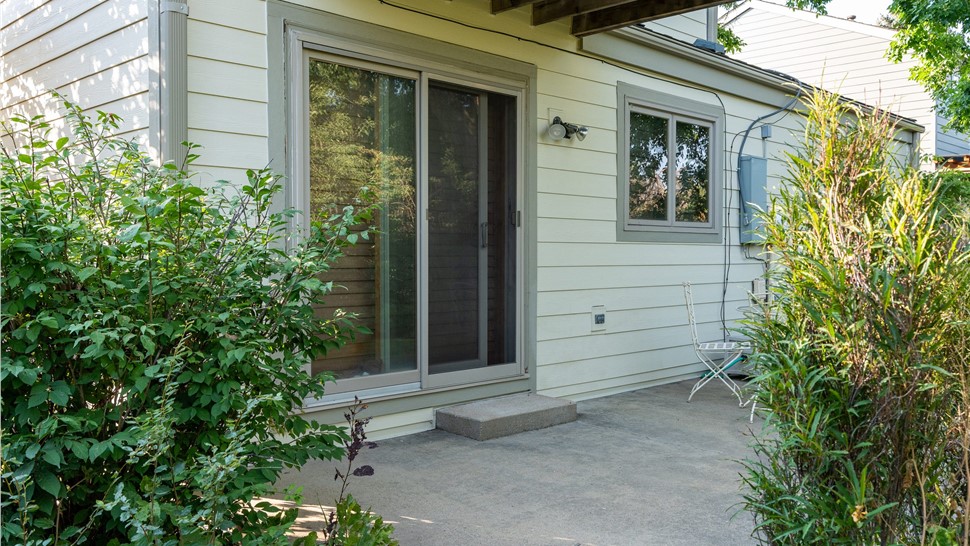 Completed James Hardie siding installation with Navajo Beige lap siding in Louisville Colorado
