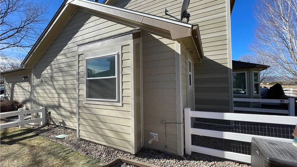 Completed James Hardie Primed siding replacement and ProVia Endure series window replacement in Loveland Colorado