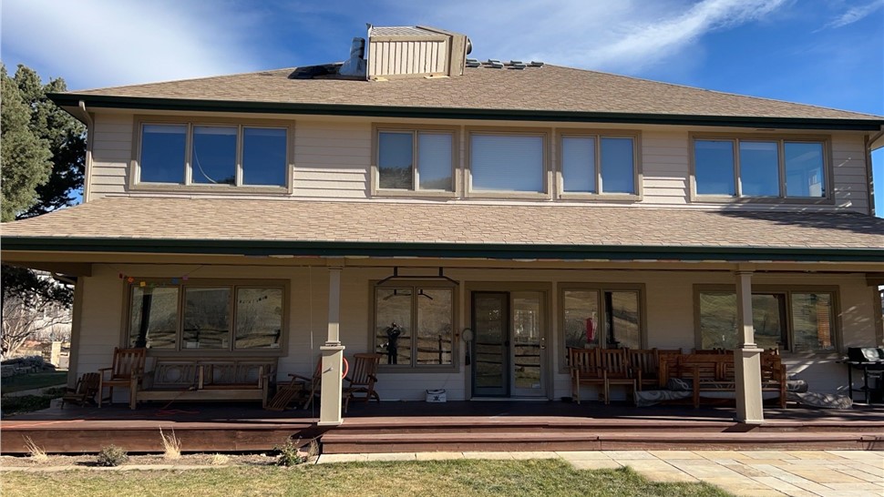 Home before siding, roofing and gutter install in Boulder, Colorado