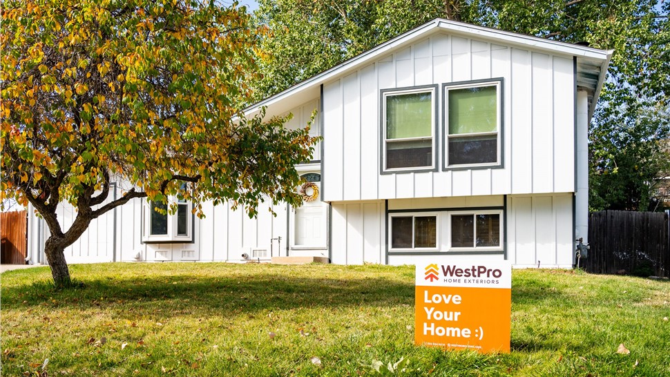 Golden, Colorado home after a full James Hardie Board and Batten Reside in Arctic White with Iron Gray trim