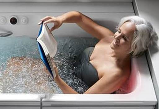 A person in a bathtub reading a bookAI-generated content may be incorrect.