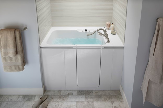 Photo of a walk in tub that is full of water